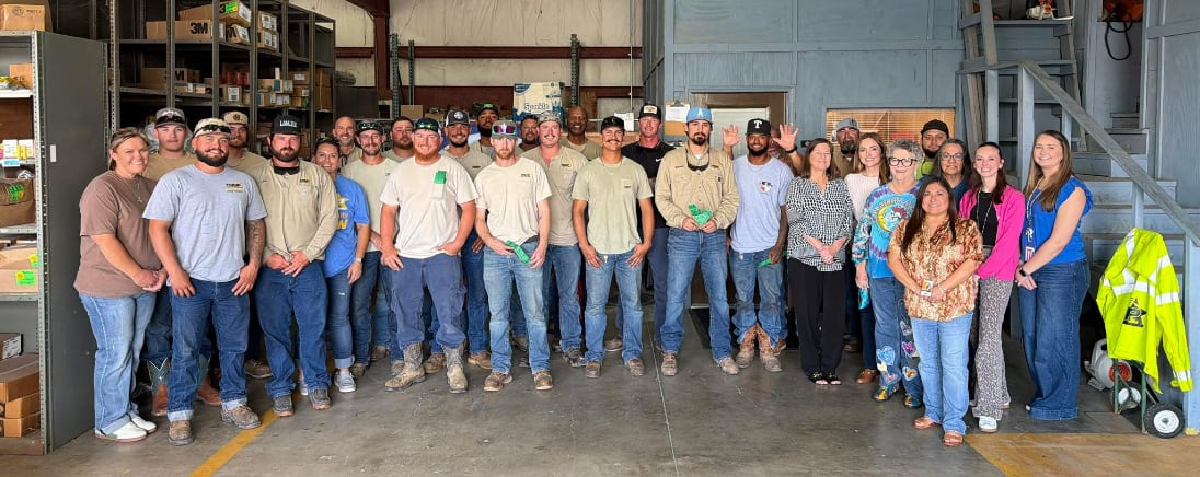 people standing in a warehouse